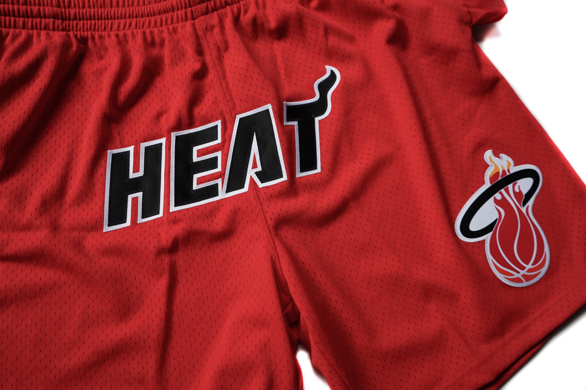 Custom Mitchell & Ness Miami Heat 1996-1997 "HEAT" Swingman Shorts (Home)